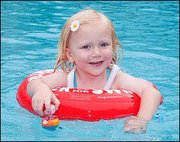 Плаваем с рождения. Раннее развитие малыша. Надувной круг SWIMTRAINER
