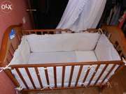 Продаю детскую кроватку Casato из натур/дерева с комплектом из 8 предм